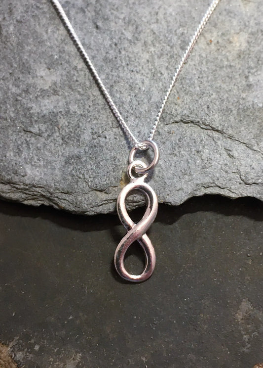 Silver infinity necklet.