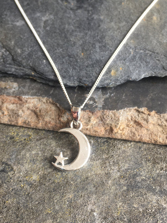 Silver moon/star pendant