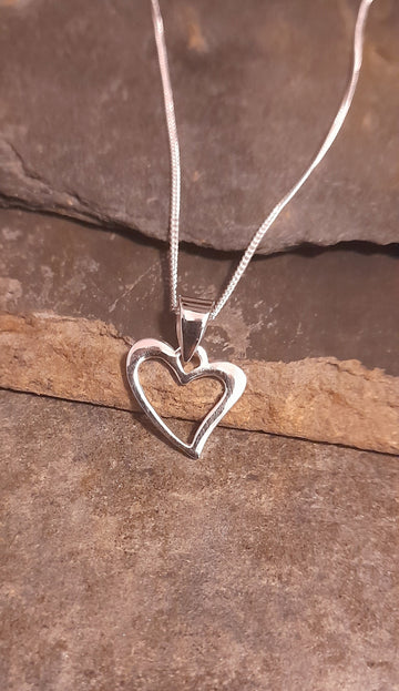 Silver heart outline pendant